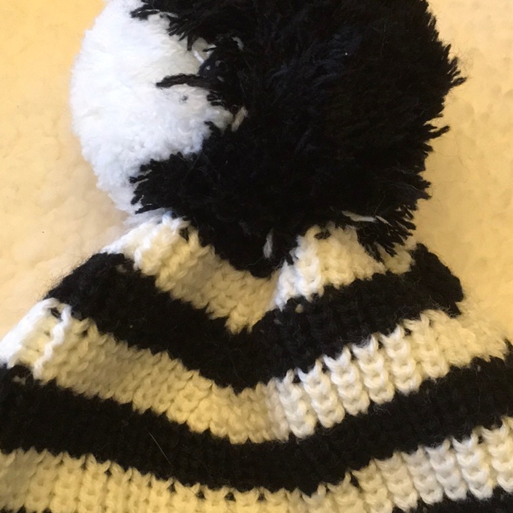 NEW Black and white Pom beanie. 104